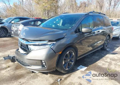 2021 Honda Odyssey Elite z USA, uszkodzony, nr VIN 5FNRL6H98MB010450